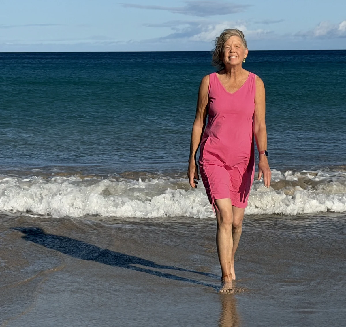 Susan walking on the beach